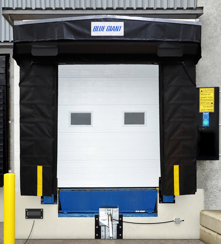 Blue Giant SilverStar soft-sided dock shelter with side curtains and head curtain framing the trailer opening